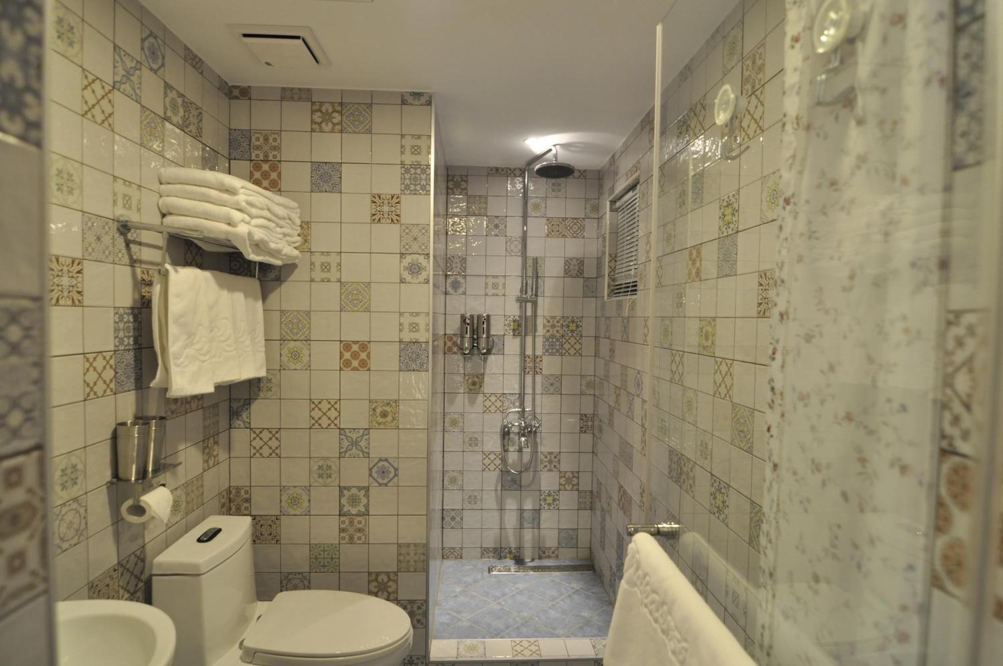 Napas Hotel Тайджун Стая снимка